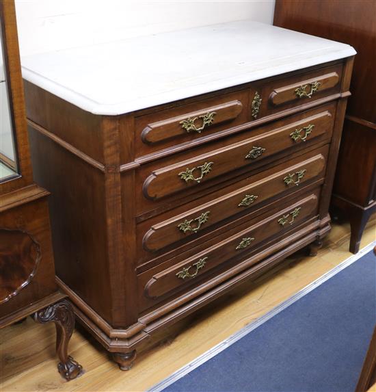 A French marble topped walnut chest of drawers W.108cm